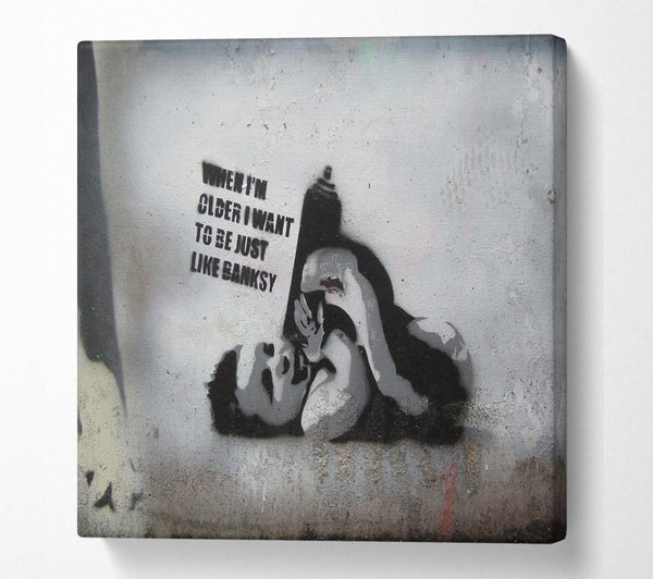 A Square Canvas Print Showing Be like Banksy Square Wall Art