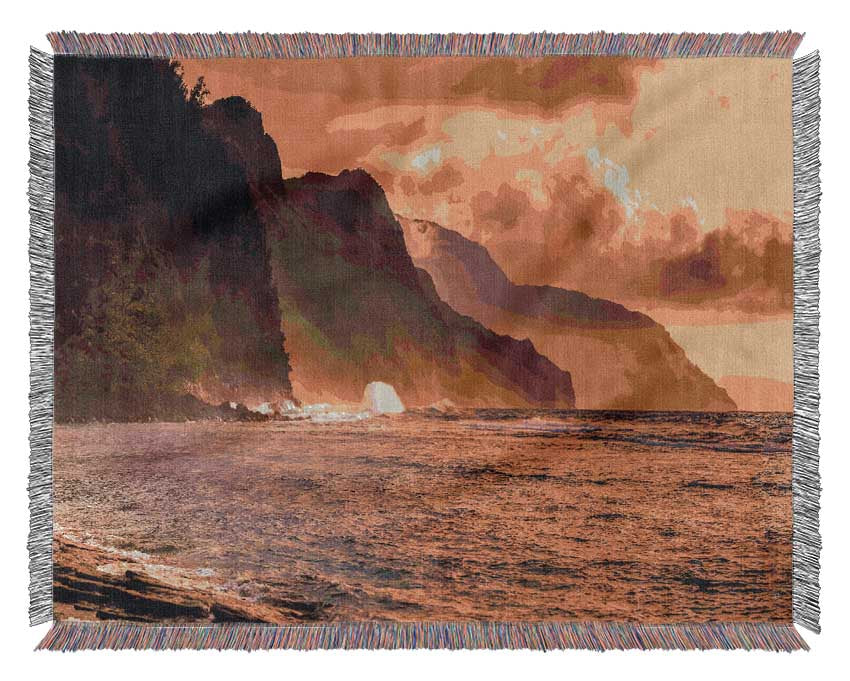 Cliff sunset crashing ocean Woven Blanket