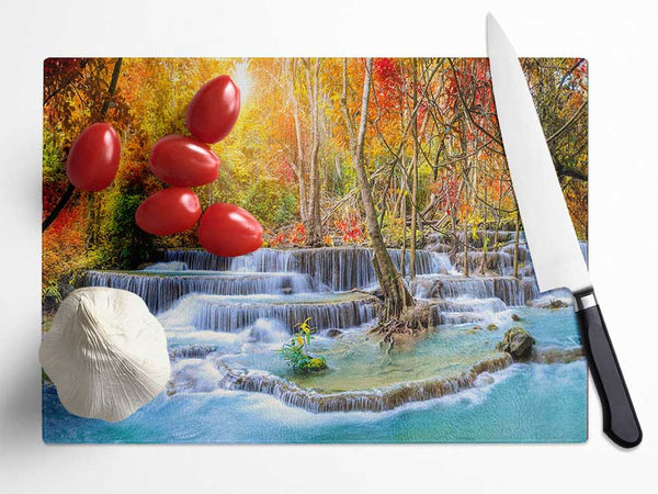 Waterfall forest sunset Glass Chopping Board