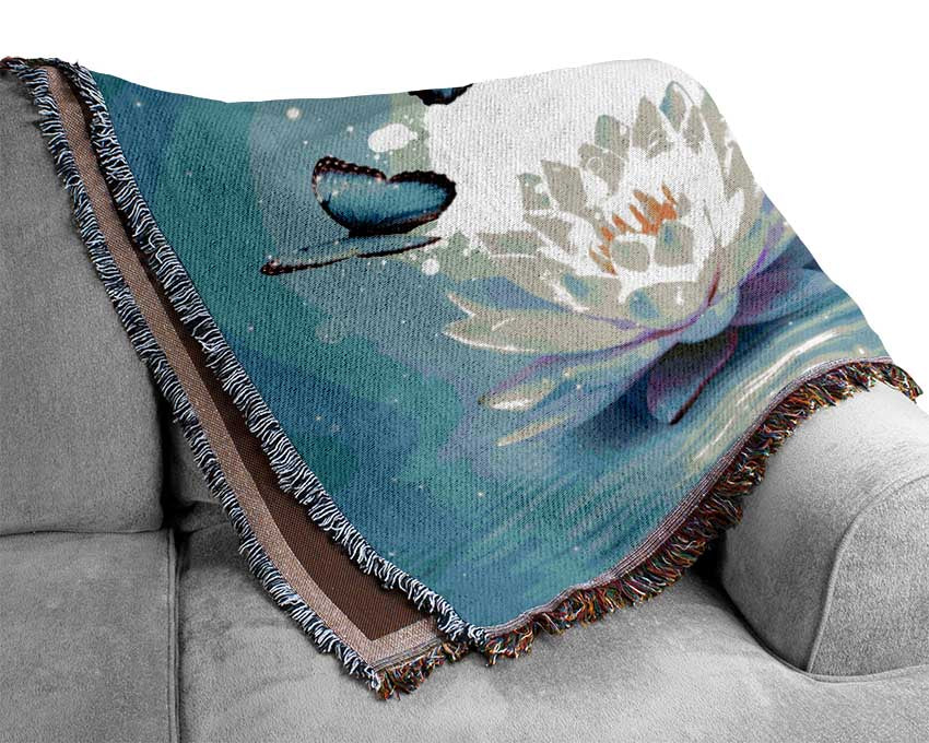 Butterflies above the lilly Woven Blanket