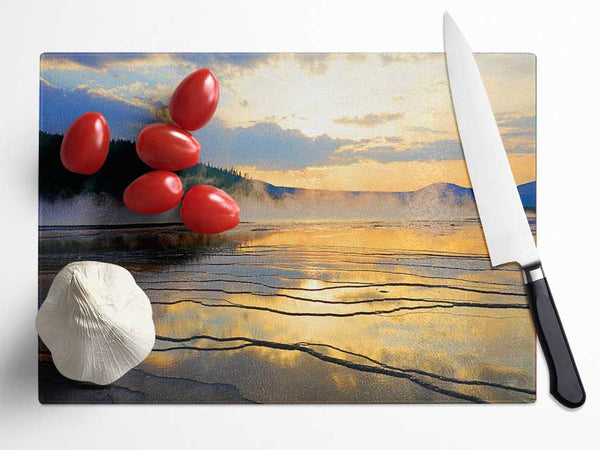 Frozen lake sunset Glass Chopping Board