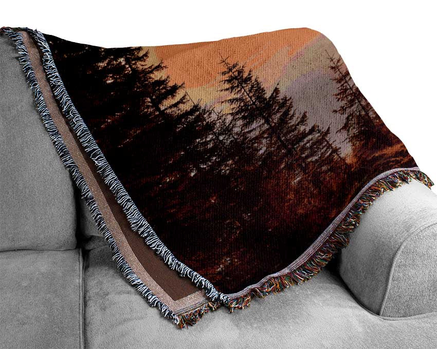 Orange Woodlands in a sunset Woven Blanket