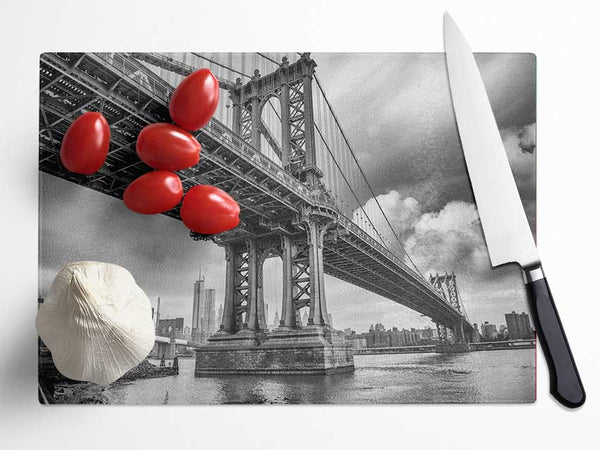 NYC black and white bridge under clouds Glass Chopping Board