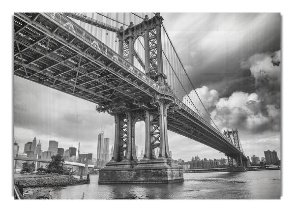 NYC black and white bridge under clouds