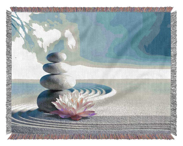 pebbles on zen beach lilly Woven Blanket