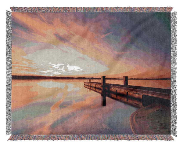 Sunset off the jeti Woven Blanket