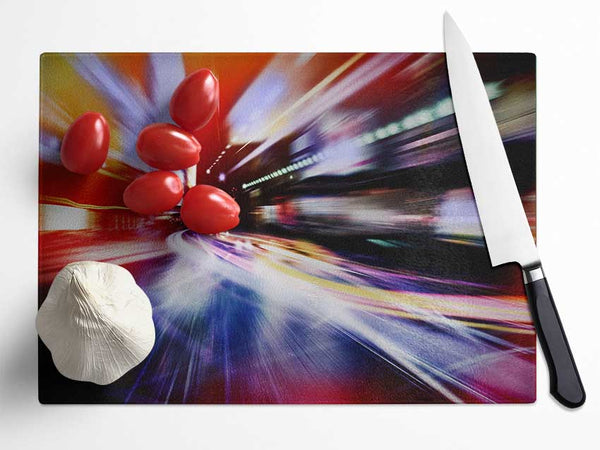 City in a blur colourful light Glass Chopping Board