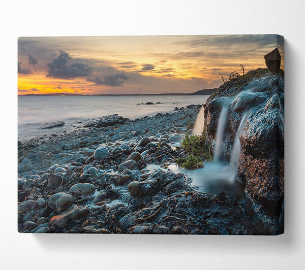 Picture of Water flows down the rocks into the sea Canvas Print Wall Art