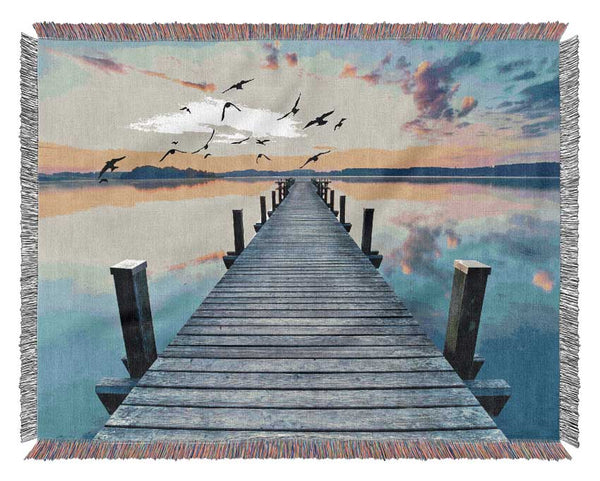 Bridge into the lake and seagulls Woven Blanket