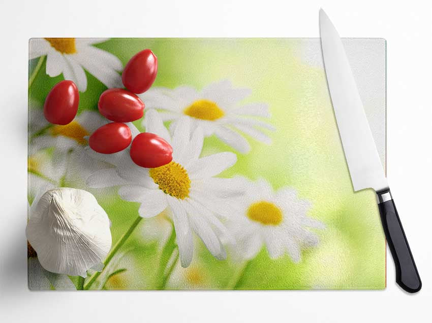 Daisies up close glowing Glass Chopping Board