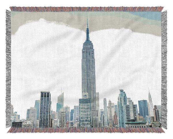 City in the distance Woven Blanket