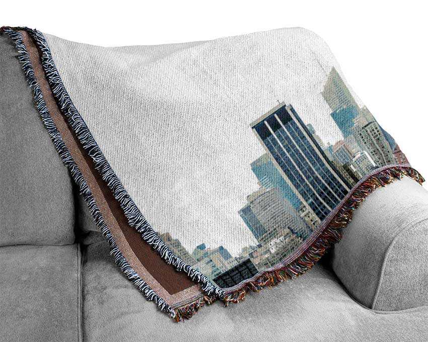 City in the distance Woven Blanket