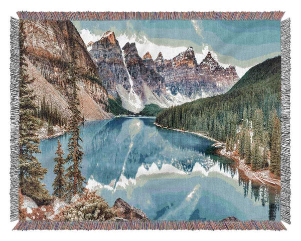 Canadian mountains with clear blue waters Woven Blanket