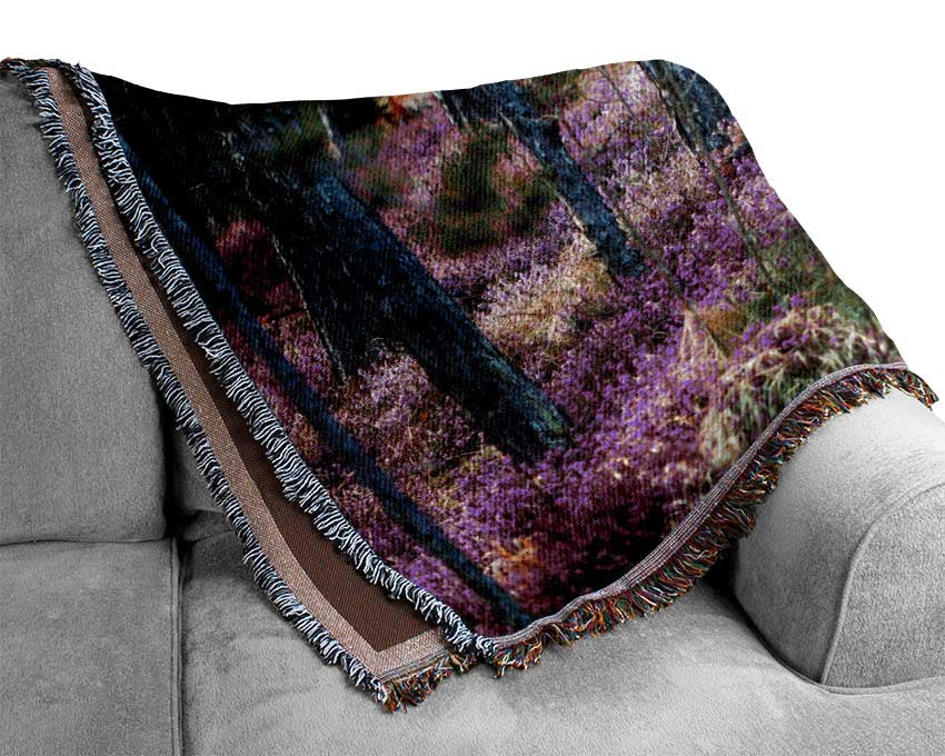 Downhill woodlands Woven Blanket