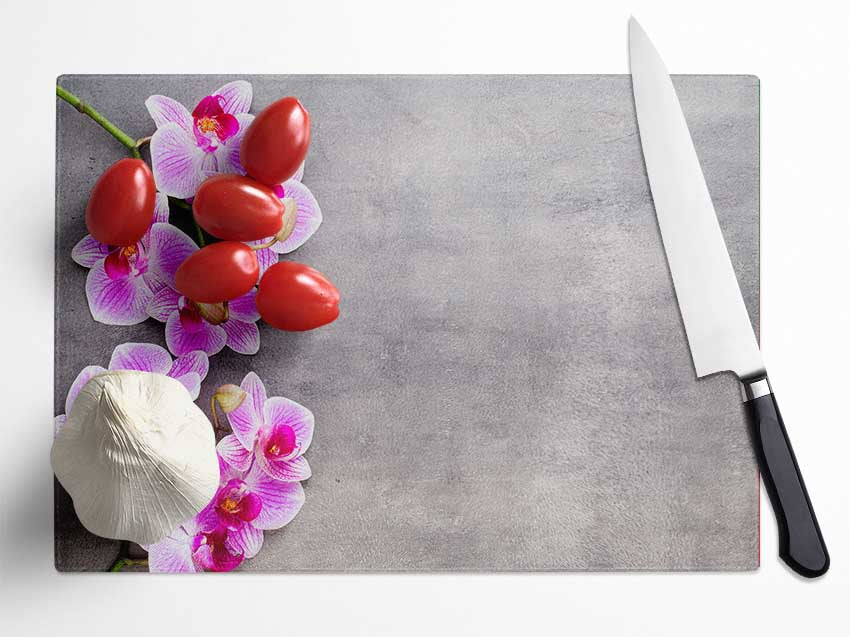 Pink Orchids on grey Glass Chopping Board