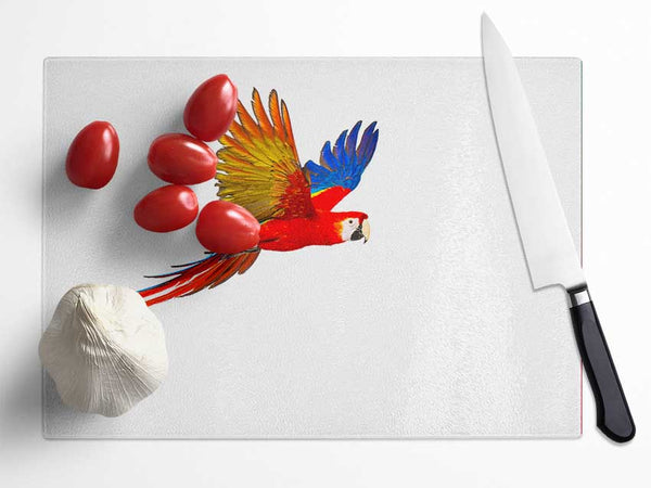 parrot in flight Glass Chopping Board