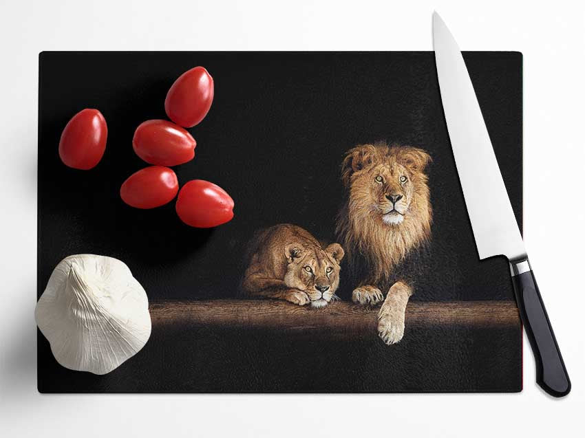 Lions resting in the dark Glass Chopping Board