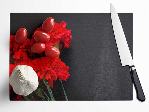 Red flowers dark background Glass Chopping Board