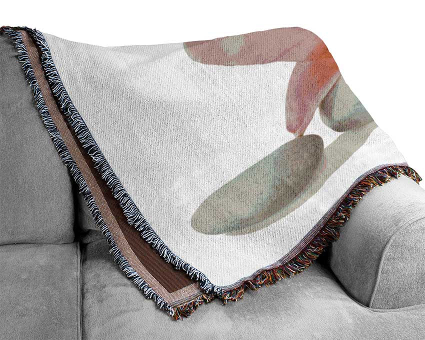 Pink Lilly on grey pebbles Woven Blanket