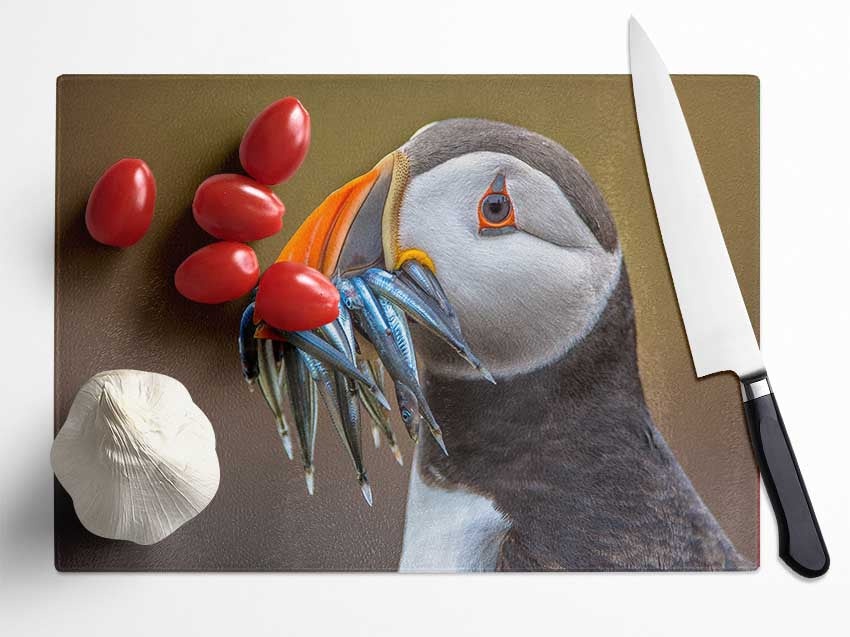 Puffin with a mouthall of fish Glass Chopping Board