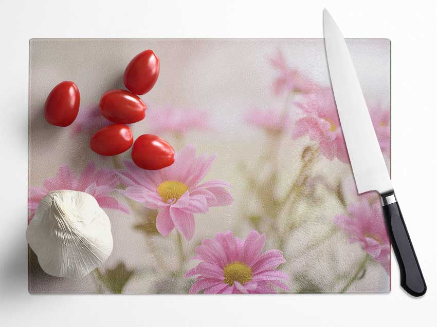 Pink flowers in soft light Glass Chopping Board