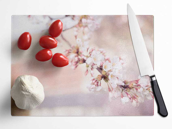 Cherry blossoms decending branch Glass Chopping Board