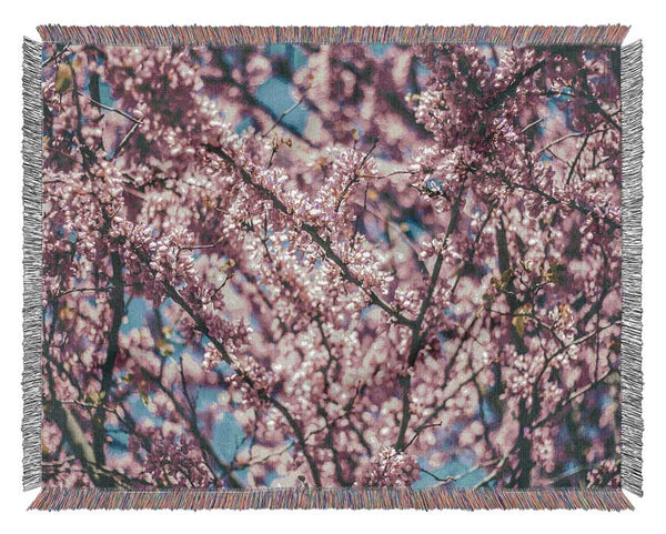 tree blossom flowers on a blue sky Woven Blanket