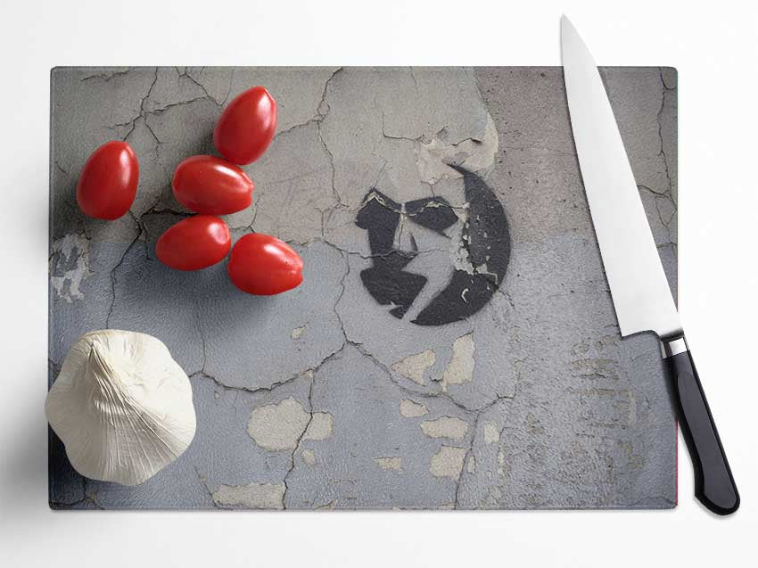 Simple street art on eroded wall Glass Chopping Board