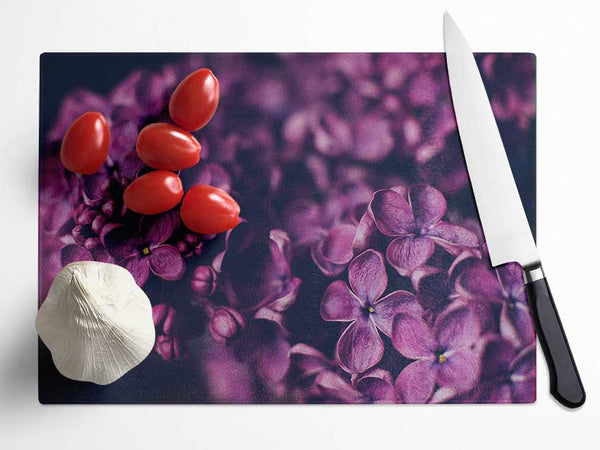 Minature purple flowers Glass Chopping Board