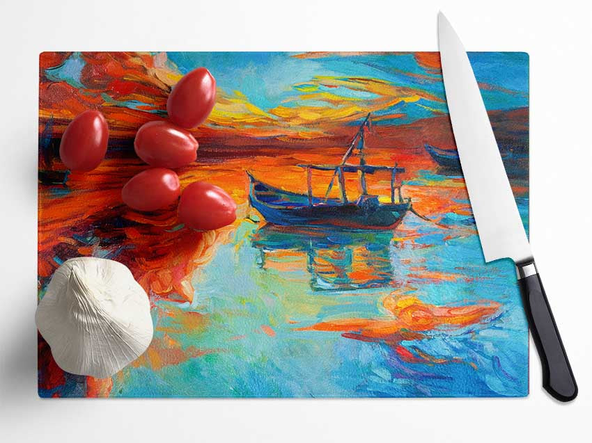 Row boat on the horizon of colour Glass Chopping Board