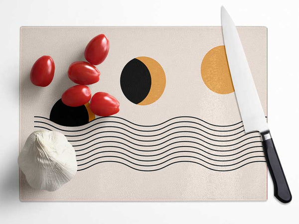 The Sun Above The Sea Glass Chopping Board