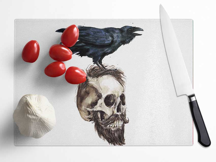 Crow On The Head Of A Skull Glass Chopping Board