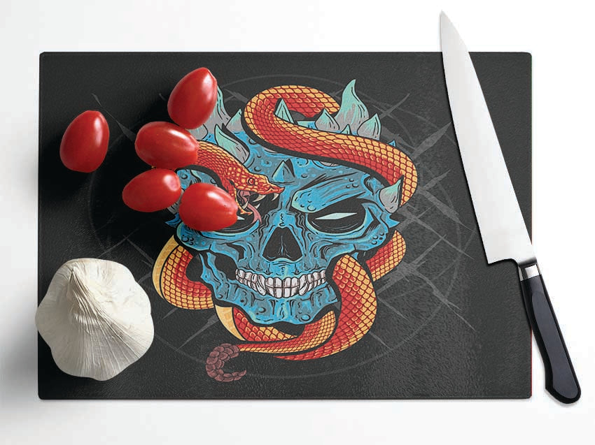 Snake Wrapped Around A Skull Glass Chopping Board