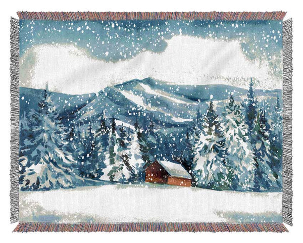 Snowy Cabin In The Mountains Woven Blanket