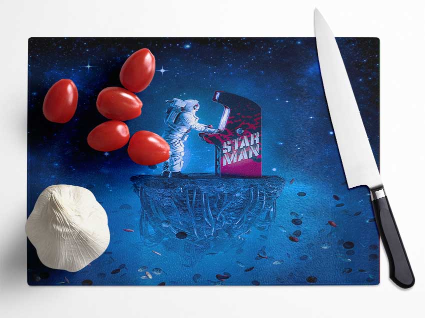 Rocketman Playing Games Glass Chopping Board